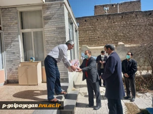 به همت اداره امور فرهنگی آموزشکده فنی و حرفه ای گلپایگان از سه خانواده شهدای دانشجوی دوران دفاع مقدس تجلیل شد. 6